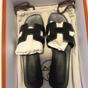 Hermès Black Oran Sandals